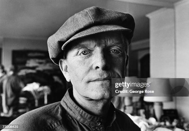 "In Cold Blood" author and popular literary figure, Truman Capote, poses during a 1980 New York, New York, portrait in his Upper Eastside apartment...