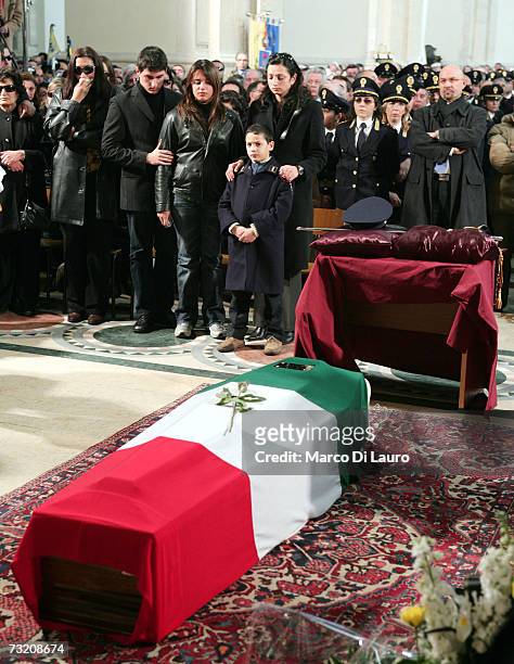 Marisa Raciti, wife of murdered Italian Police officer Filippo Raciti stands with her 8-year-old son Alessio and 14-year-old daughter Fabiana at his...