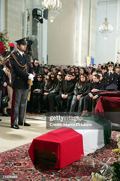 Marisa Raciti, wife of murdered Italian Police officer Filippo Raciti sits with her 8-year-old son Alessio and 14-year-old daughter Fabiana at his...