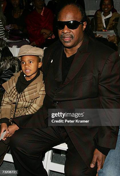 Singer Stevie Wonder and his children pose in the front row at the Kai Milla Fall 2007 fashion show during Mercedes-Benz Fashion Week in the Salon in...