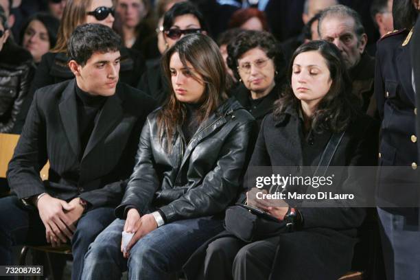 Marisa Raciti, wife of murdered Italian police officer Filippo Raciti, her 8-year-old son Alessio, and her 4-year-old daughter Fabiana attend his...