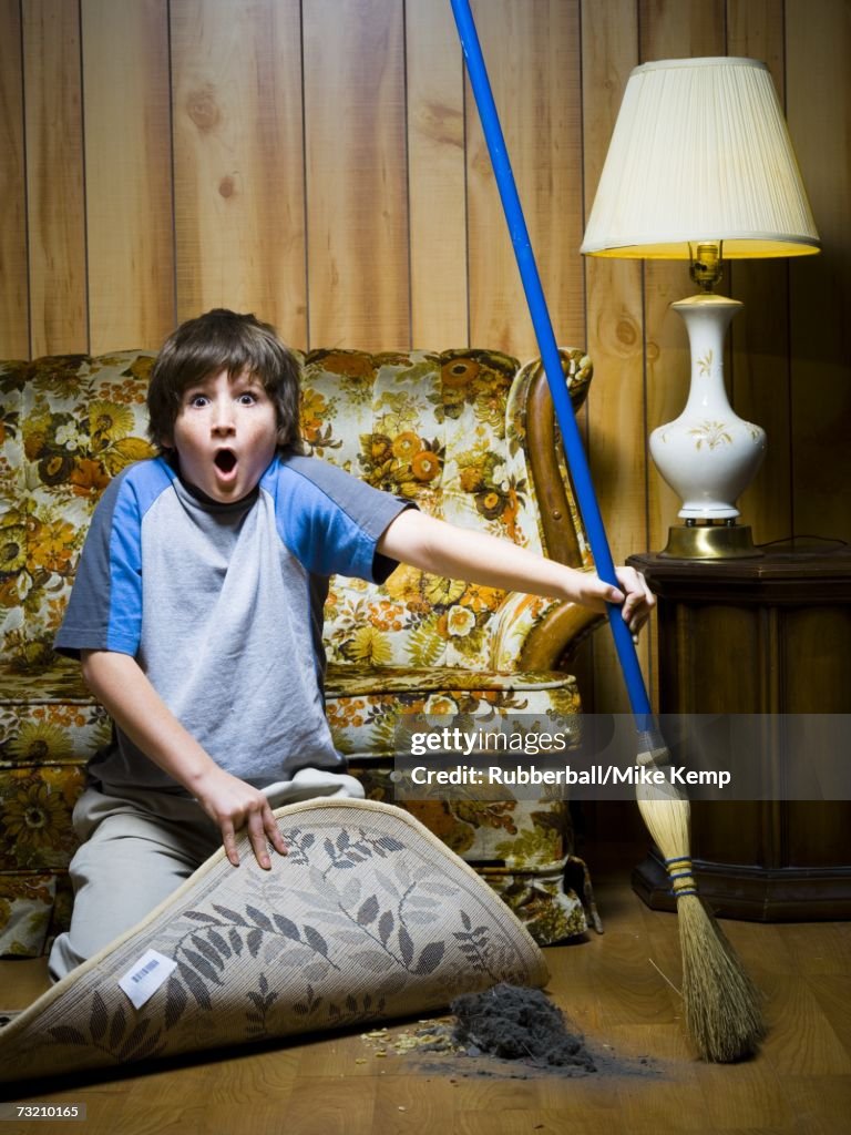 Tom Sweeps Under Rug Boy Sweeping Dirt Under Rug High-Res Stock Photo - Getty Images