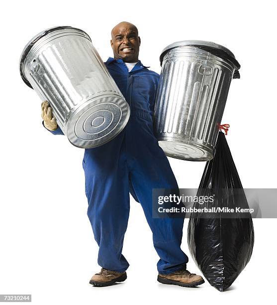 garbage man with trash cans - smiling garbage collector stock pictures, royalty-free photos & images