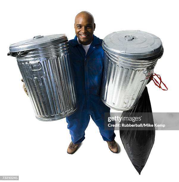 garbage man with trash cans - smiling garbage collector stock pictures, royalty-free photos & images