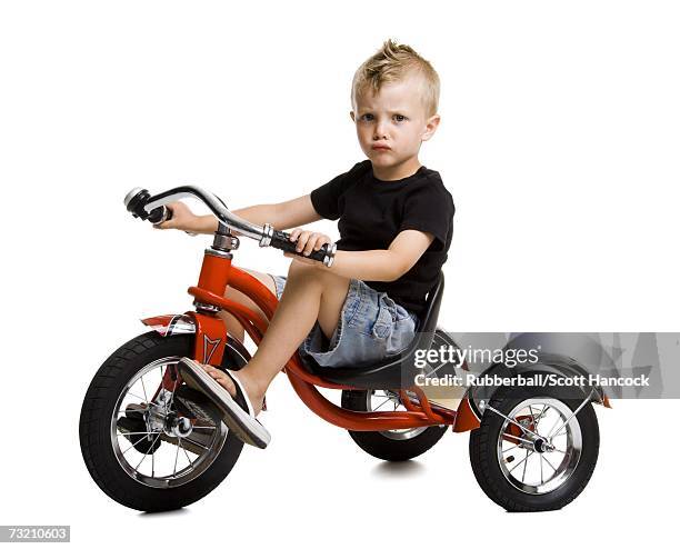 boy on tricycle - 三輪車 ストックフォトと画像