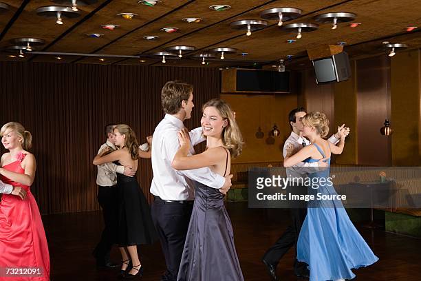 teenage couple dancing - ballroom stockfoto's en -beelden