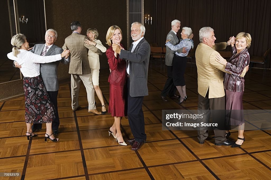 Senior couples dancing
