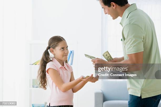 Child Getting Money 1,282 Child Giving Money Stock Photos, High-Res Pictures, and Images ...