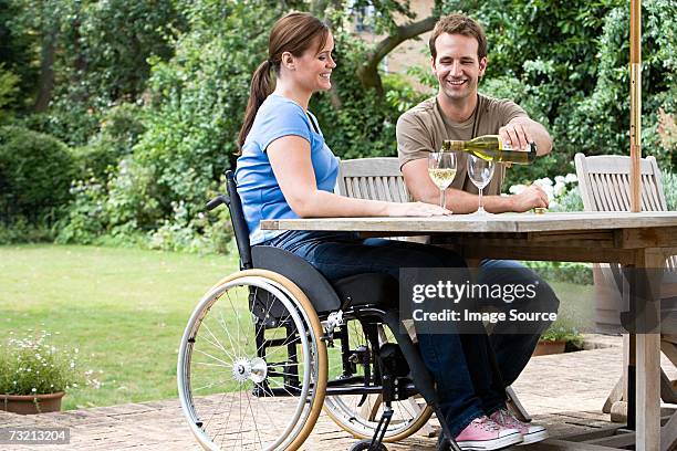 couple with a bottle of wine - wine bottle transport stock pictures, royalty-free photos & images