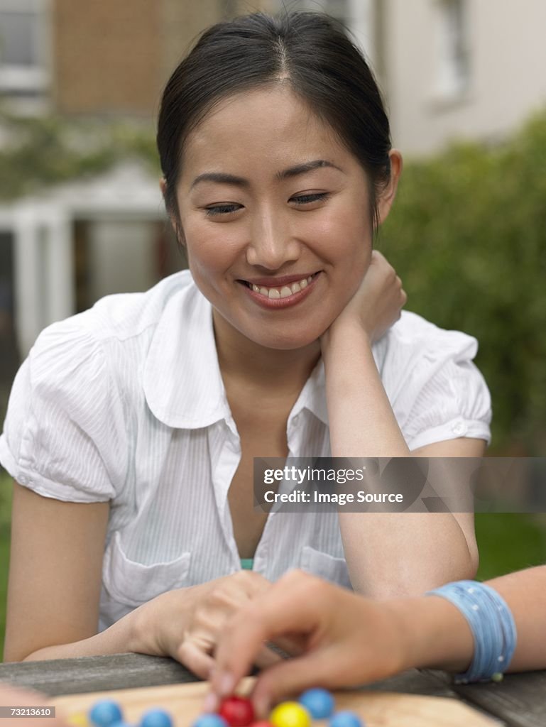 Young woman playing game