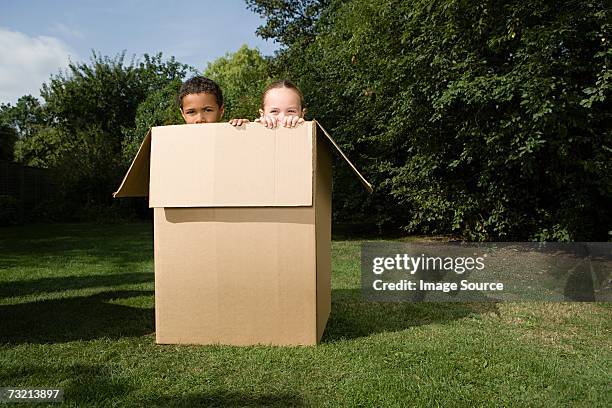 Hiding In Box Child Hiding In Box Photos and Premium High Res Pictures - Getty Images