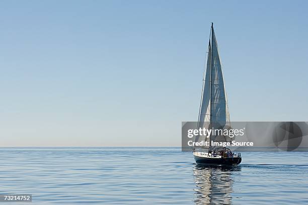 sailboat - blue sailboat stock pictures, royalty-free photos & images