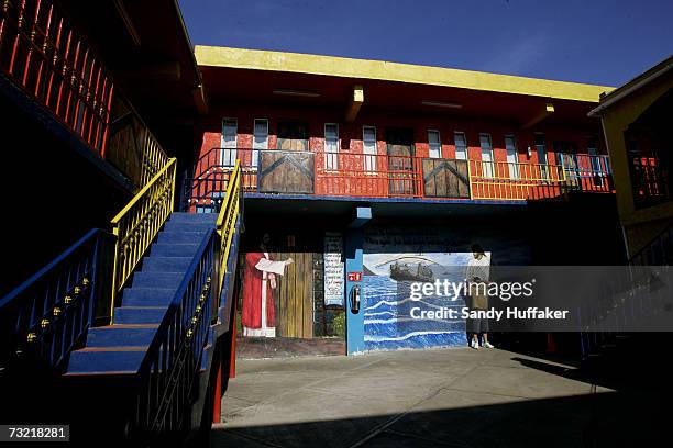 Man stands against a wall in the courtyard of the drug rehab center at the Centro de Rehabilitacion at Los Tesoros Escondidos December 14, 2006 in...