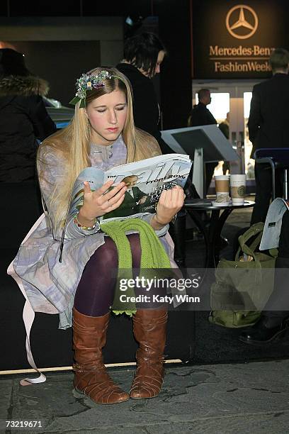 Ashley Halick reads the Daily in the lobby during Mercedes-Benz Fashion Week Fall 2007 February 5, 2007 in New York City.