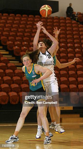 Tall Ferns Donna Lofhagen clashes with Australian Opal's Emily McInerny and Jacinta Hamilton during the Second Game of the FIBA Oceania Womens...