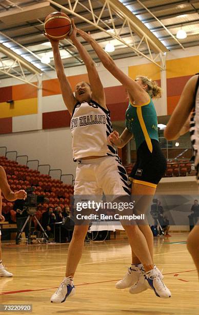 Tall Fern's Kate McMeeken-Ruscoe gets her shot blocked by Australian Opal's Carly Wilson during the Second Game of the FIBA Oceania Basketball...