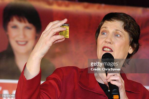 Prime Minister Helen Clark holds up a pledge card at a Grey Power meeting in Motueka, Nelson, New Zealand, Tuesady August 16th 2005.