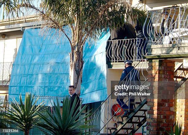 Unit is kept under cover by police in a hotel on Shelly Beach Road in Herne Bay, Auckland, New Zealand, Friday, August 5th, 2005. An man in the unit...