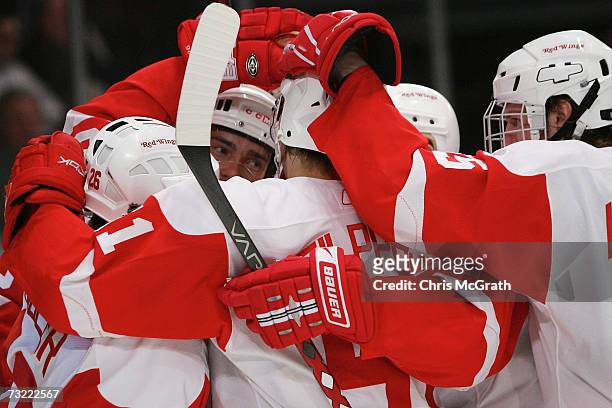 Jiri Hudler of the Detroit Red Wings is mobbed by team mates after scoring a goal against the New York Rangers February 5, 2007 at Madison Square...