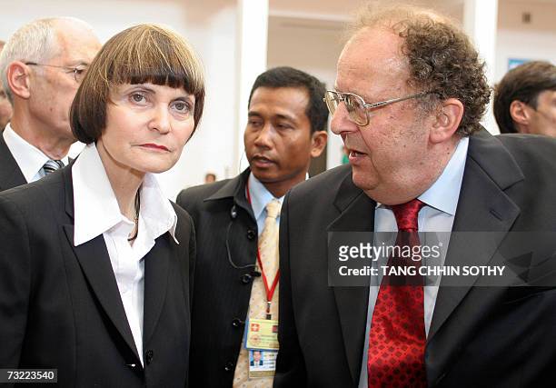 Swiss President Micheline Calmy-Rey looks on as Doctor Beat Richner of the Kantha Bopha Children's Hospital talks during her visit to the Kantha...