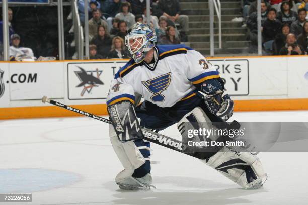 Manny Legace of the St. Louis Blues follows the action during a game against the San Jose Sharks on January 20, 2007 at the HP Pavilion in San Jose,...