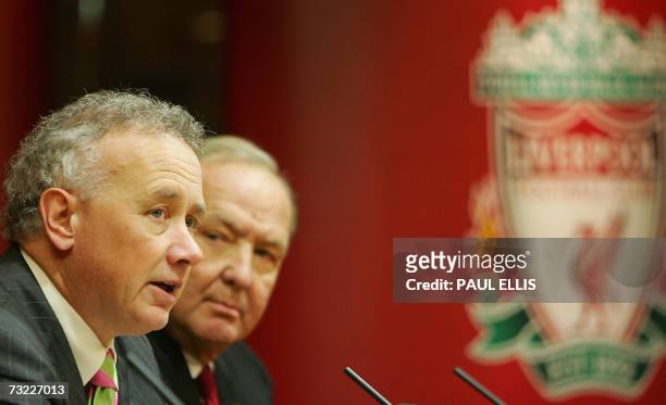 Liverpool, UNITED KINGDOM: US business tycoon Tom Hicks listens to Liverpool football club Chief Executive Rick Parry at a press conference at the...