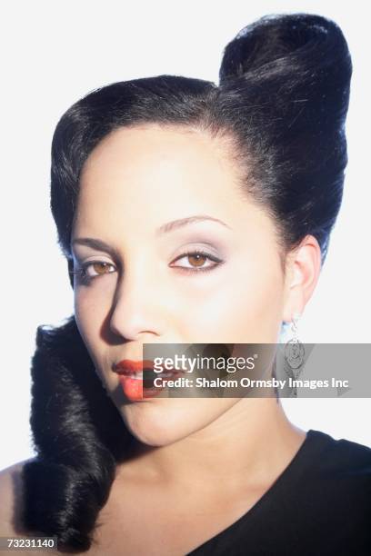 close up studio shot of woman with hair up - hot polynesian girls stock pictures, royalty-free photos & images