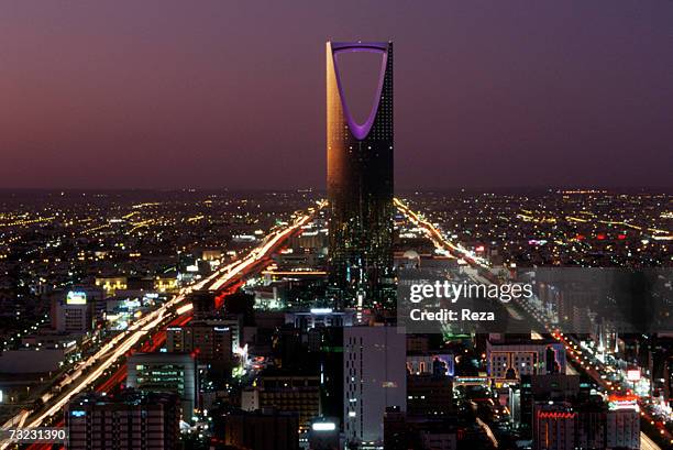 Kingdom Center , the tallest skyscraper in Saudi Arabia, dominates the evening cityscape on December, 2002 in Riyadh, Saudi Arabia.
