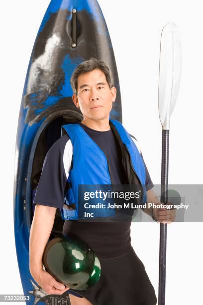 studio shot of senior asian man with kayak - life jacket isolated stock pictures, royalty-free photos & images