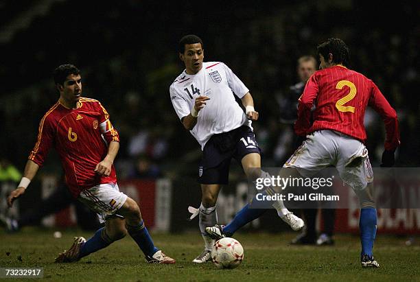 Liam Rosenior of England takes on Antonio J Barragan Fernandez and Raul Garcia Escudero of Spain during the International friendly match between...