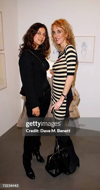 Fabiola Brown and Sarah Woodhead attend the private view of the exhibition of George Condo's new paintings and sculptures at the Simon Lee Gallery...