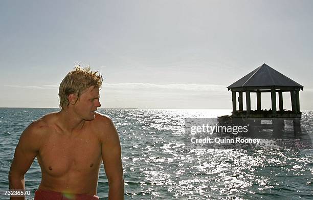 Nick Riewoldt of the Saints rests in the boat after swimming with seals in Port Phillip Bay whilst on the St Kilda Saints AFL Community Camp at the...