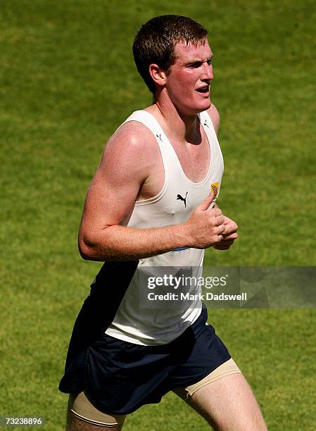 Xavier Ellis of the Hawks runs laps during the Hawthorn Hawks AFL Community Camp at the North Hobart Oval on February 7, 2007 in Hobart, Australia.