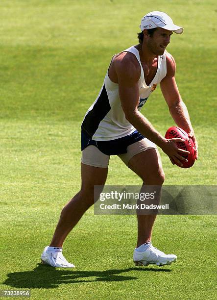 Campbell Brown of the Hawthorn Hawks looks to pass the ball in training at the North Hobart Oval during the clubs AFL Community Camp on February 7,...