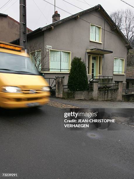 Vehicule drives past the house of the grand-mother of French convicted serial killer Francis Heaulme, 07 February 2007 in Vaux, eastern France....