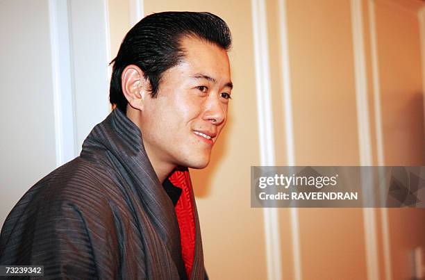 King of Bhutan Jigme Khesar Namgyel Wangchuck smiles during a meeting with unseen Indian Home Minister Shivraj Patil in New Delhi, 07 February 2007....