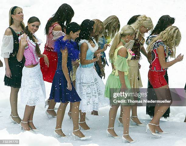 Twenty-two young contestants pose in dirndls in the snow on February 7, 2007 at the Europapark Rust , ahead of the Miss Germany 2007 pageant...