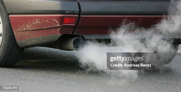 Car emits exhaust fumes on February 7, 2007 in Berlin, Germany. The European Commission announced new carbon dioxide targets for car makers which the...