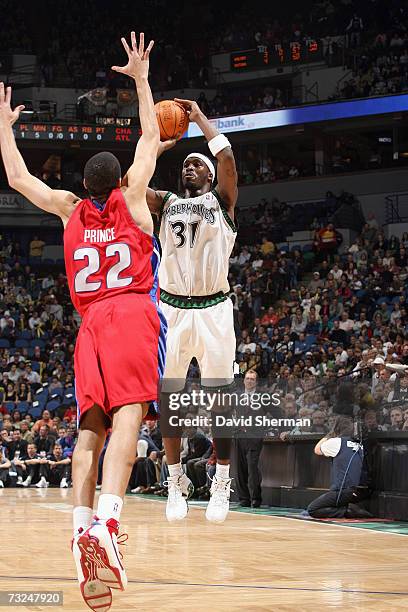Ricky Davis of the Minnesota Timberwolves shoots against Tayshaun Prince of the Detroit Pistons during the game at Target Center on January 19, 2007...