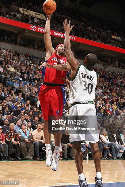 Rasheed Wallace of the Detroit Pistons shoots against Mark Blount of the Minnesota Timberwolves during the game at Target Center on January 19, 2007...