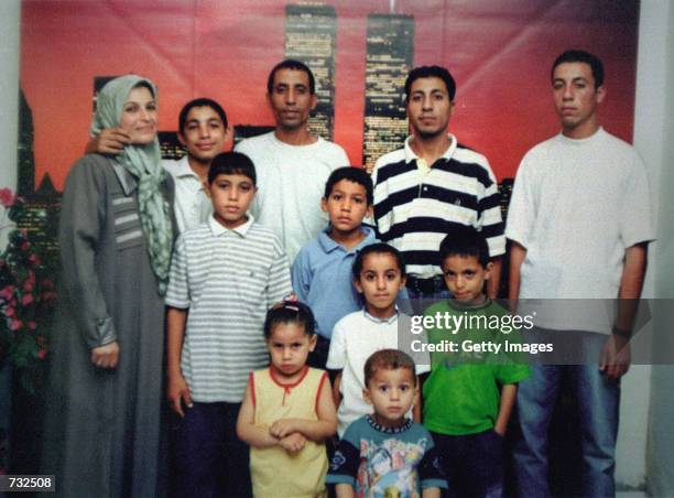 The family of 12 year-old Palestinian boy Mohammed Dura, center, in blue shirt, poses in a family photo at their home in the Gaza Strip. Mohammed's...