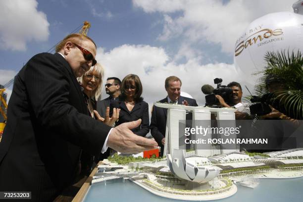 Sheldon Adelson , Chairman of Las Vegas Sands with his wife Miriam Adelson and William Weidner , President and Chief Operating Officer of Las Vegas...