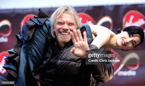 Richard Branson and Dita Von-Teese launches Virgin Media at Convent Garden Market on February 8, 2007 in London, England. Branson will spend the day...