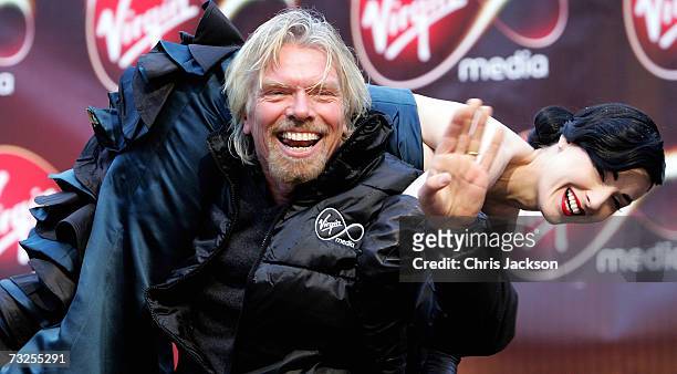 Richard Branson and Dita Von-Teese launches Virgin Media at Convent Garden Market on February 8, 2007 in London, England. Branson will spend the day...