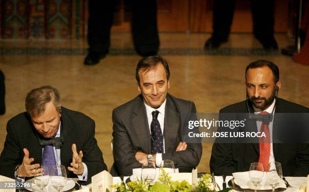 Secretary General Jaap de Hoop Scheffer , Spanish interior minister Jose Antonio Alonso and Afghan education minister Hanif Atmar sit for an informal...