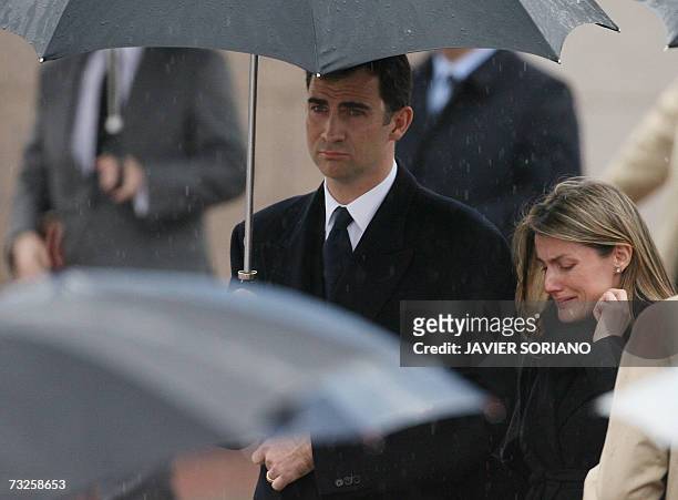 Spain's Princess Letizia departs with husband Prince Felipe from the crematorium of Tres Cantos after the funeral of her younger sister Erika Ortiz...