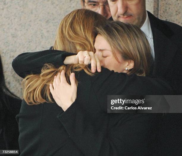 Princess Letizia of Spain and Princess Cristina embrace during the funeral for Erika Ortiz, younger sister of Princess Letiza, on February 08, 2007...