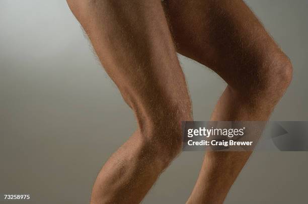 muscular mature man's legs, close up - benton bildbanksfoton och bilder