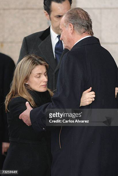 King Juan Carlos comforts Princess Letizia of Spain during the funeral for Erika Ortiz, younger sister of Princess Letiza, on February 08, 2007 at La...