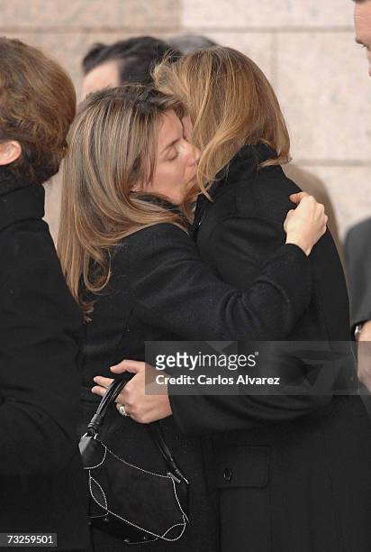 Princess Letizia of Spain embraces Princess Cristina at the funeral for Erika Ortiz, younger sister of Princess Letiza, on February 08, 2007 at La...